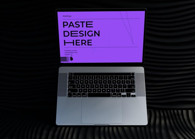 Mockup de portátil con fondo negro