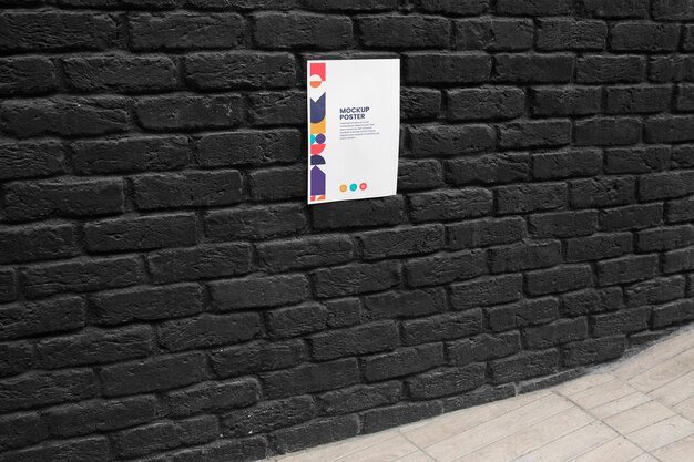 Mockup de poster pegado en pared