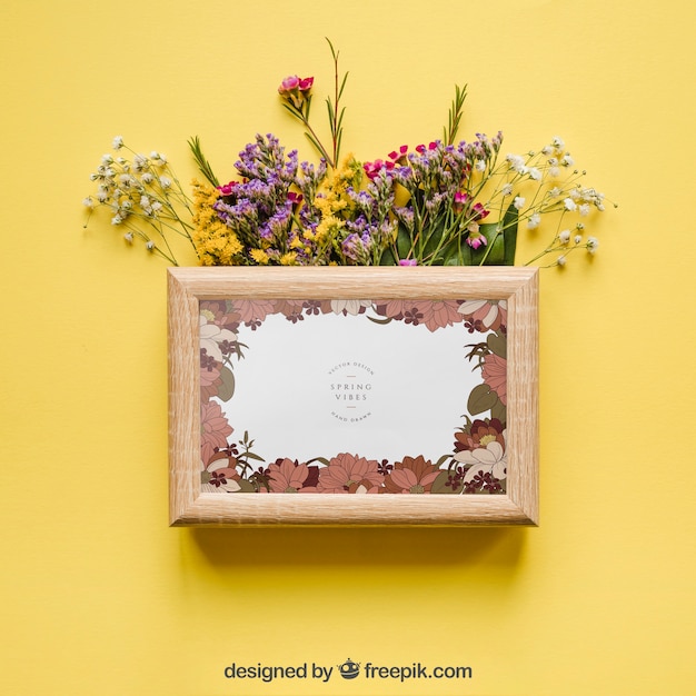 PSD mockup de primavera con marco y flores