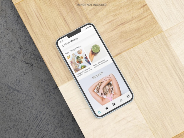 Mockup de smartphone en mesa de madera