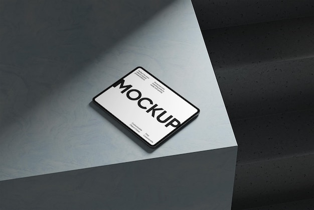 Mockup de la tableta en la superficie de hormigón