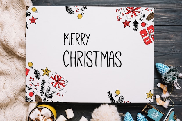 Mockup de tarjeta de papel con elementos de navidad