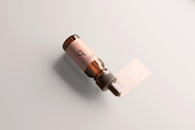 PSD mockups de botellas con cuentagotas de vidrio ámbar