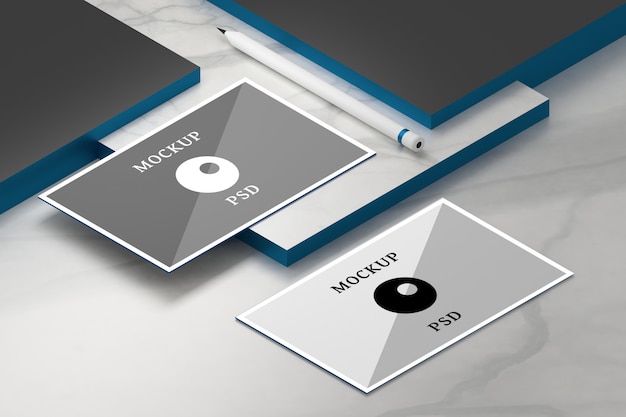 PSD modèle avec deux cartes de visite horizontales et un crayon sur une surface en marbre