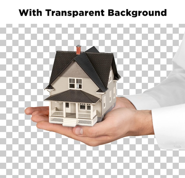 Modèle de maison tenue dans les mains
