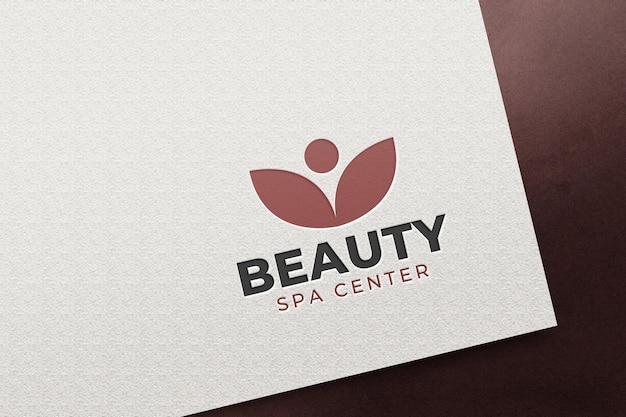 Modelo de logotipo de spa de beleza em relevo em papel branco