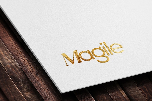 Modelo de logotipo dourado de luxo em textura de papel branco