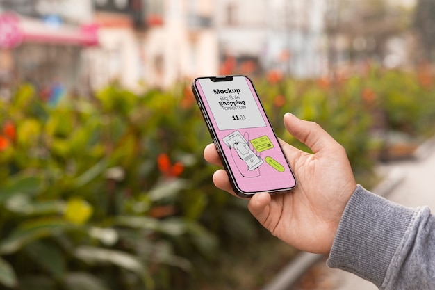 Modelo de smartphone em mão