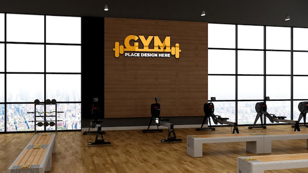 moderner Fitnessraum mit Wanddekoration aus Holz für das Logo des Fitnessstudios