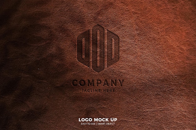 Modernes logo-mockup-leder geprägt auf braunem lederhintergrund
