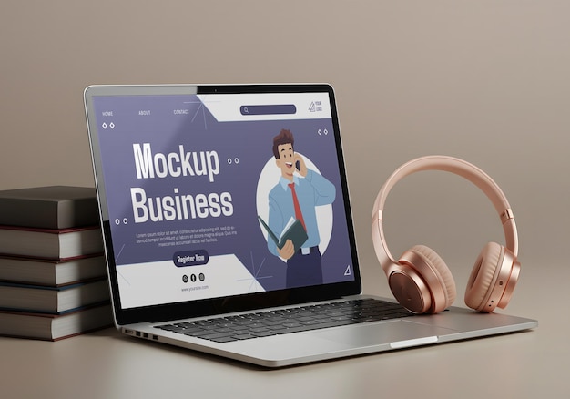 Moderno modelo de portátil de negocios, auriculares y libros en un fondo neutral