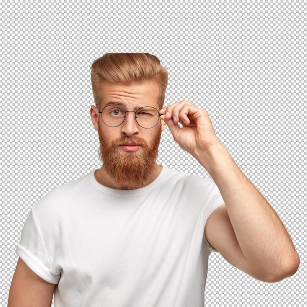 Modischer cooler Mann, junger Mann mit dickem Bart, blinkt mit dem Auge, trägt runde Brille.