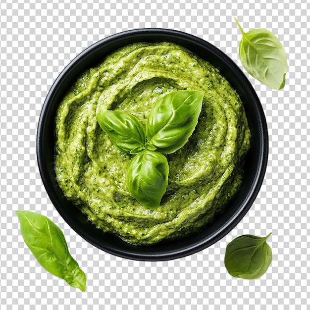 Molho de pesto fresco em uma tigela preta, vista de cima isolada em um fundo transparente
