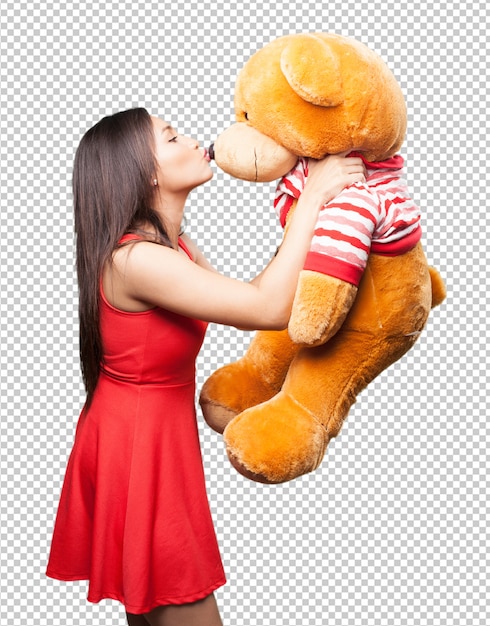 PSD mujer asiática besando a un oso de peluche