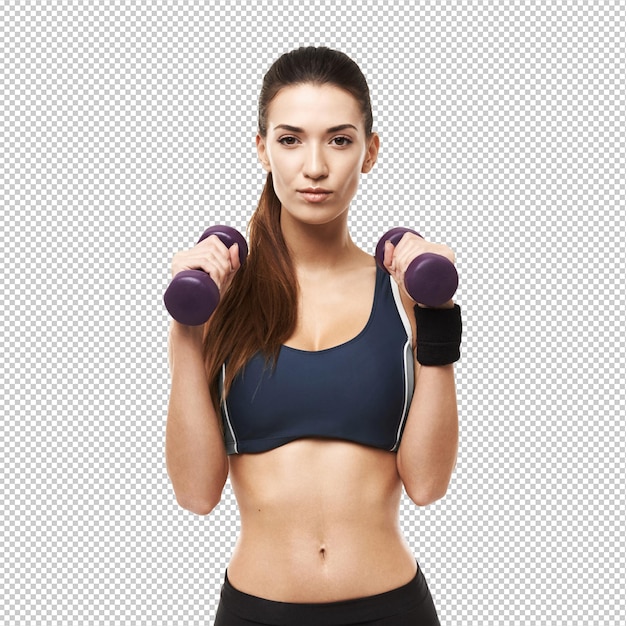 Mujer deportiva con pesas en ropa deportiva posando en blanco