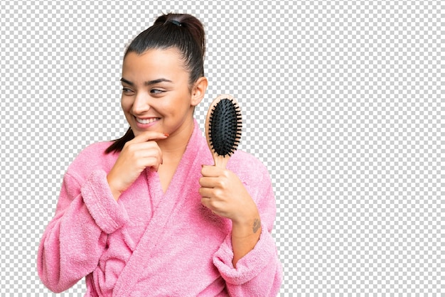 Mujer joven y bonita sobre el fondo de la llave de croma aislada