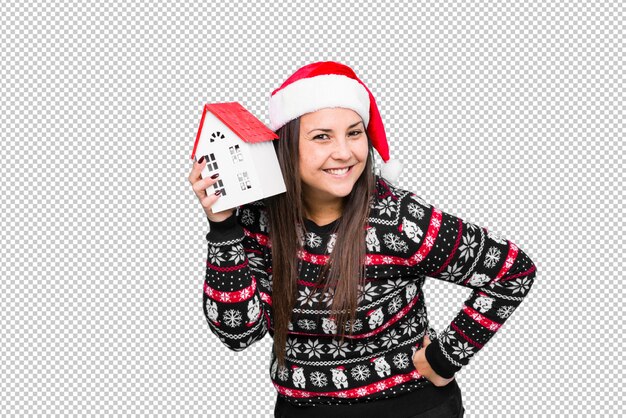 Mujer joven celebrando el día de navidad