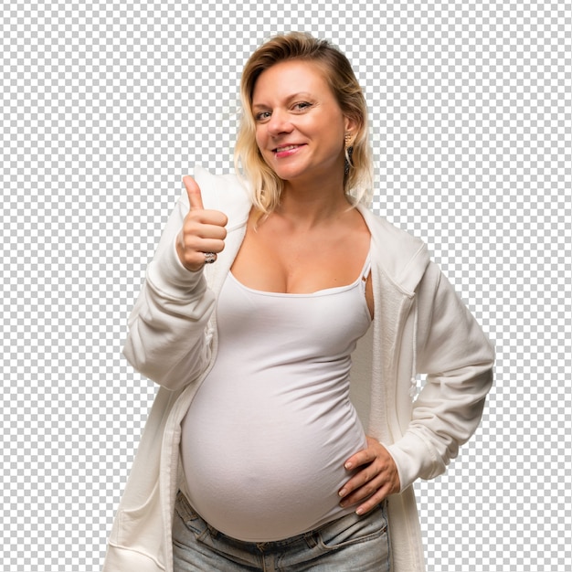 Mujer rubia embarazada con sudadera blanca dando un pulgar arriba gesto y sonriendo