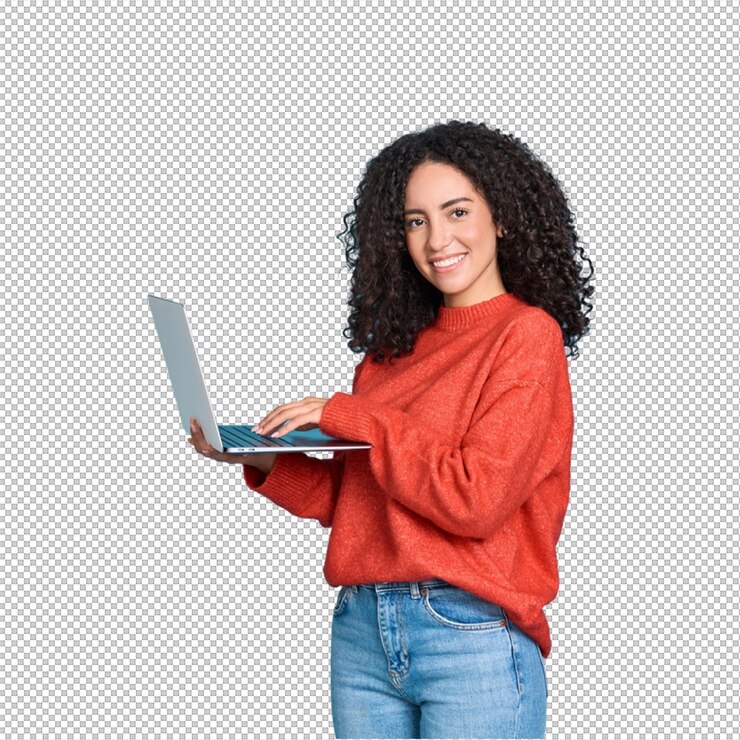 PSD mulher com cabelo encaracolado usando um laptop sorrindo vestindo um suéter vermelho e calças de ganga azuis