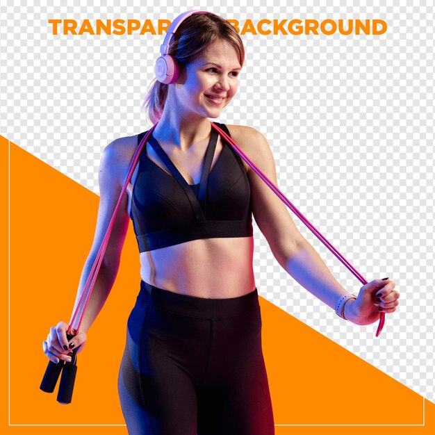 Mulher em roupas de ginásio segurando corda de salto com fundo transparente