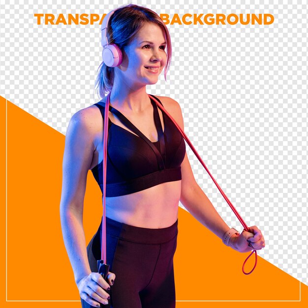 Mulher em roupas de ginásio segurando corda de salto com fundo transparente