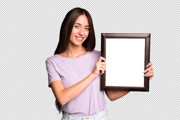 Mulher jovem e bonita com um porta-retrato vazio em branco