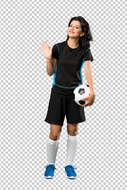 PSD mulher jovem, jogador de futebol, saudando, com, mão, com, feliz, expressão