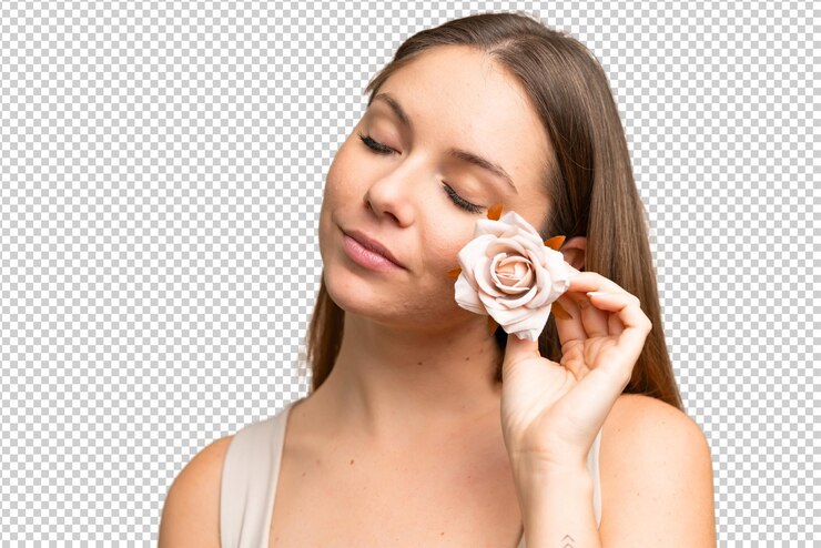 PSD mulher loira jovem sobre fundo de chave de croma isolado segurando flores retrato em close-up