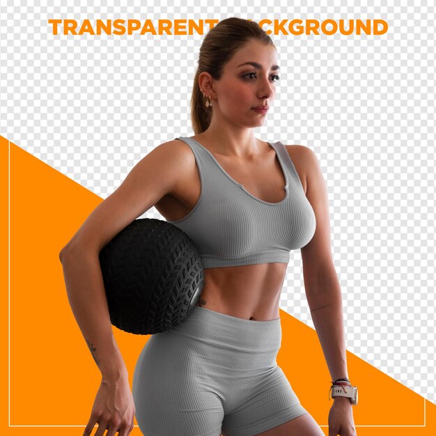 Mulher no ginásio segurando uma bola de medicina com um fundo transparente
