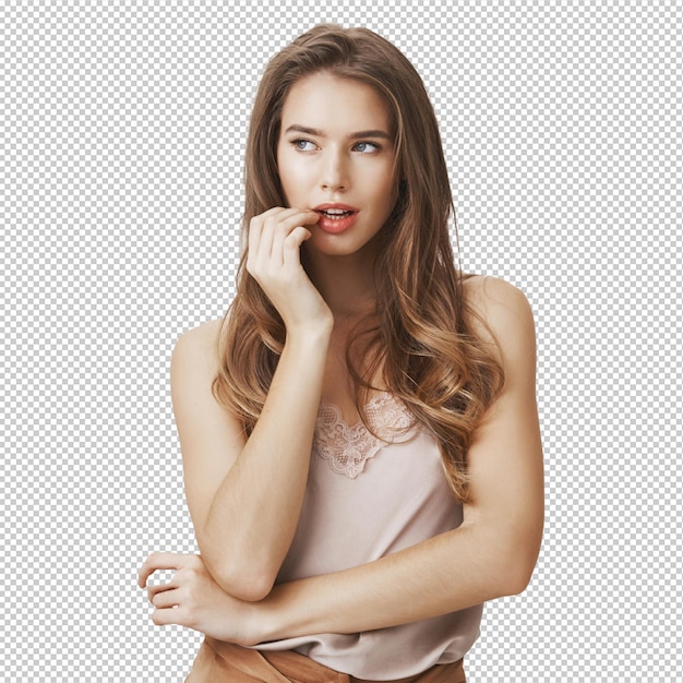 Mulher sexy mordendo o dedo e olhando para a esquerda com desejo