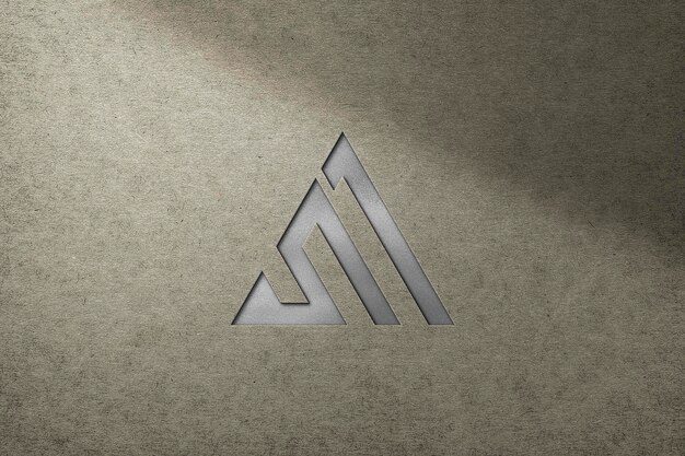 Mutiges silbernes logo-modell auf konkretem beschaffenheits-hintergrund