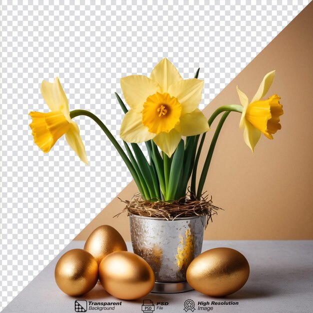 PSD narzissenblumen in einer aluminiumvase mit einer mit gold gewickelten ostereiergruppe in einem isolierten vogelnest