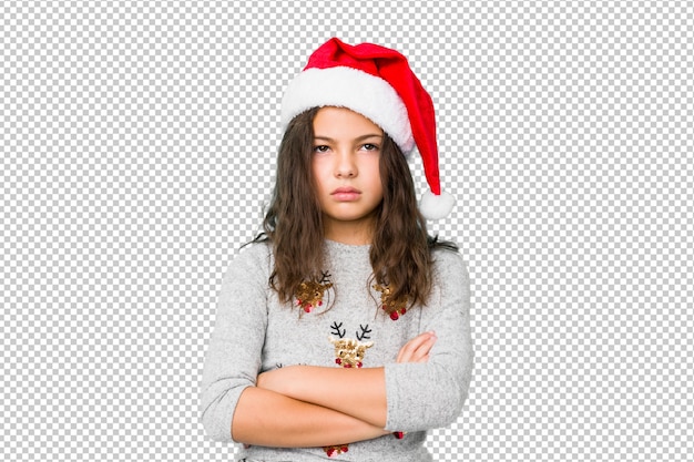 Niña celebrando el día de Navidad cansado de una tarea repetitiva.