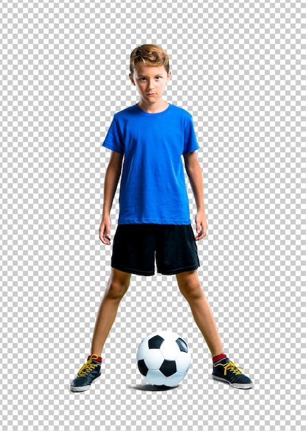 Niño jugando futbol