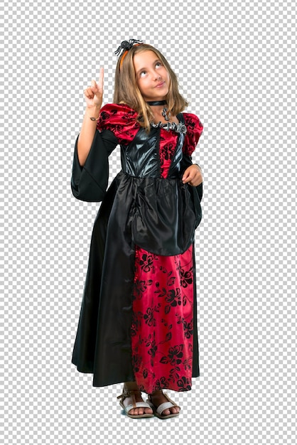 Niño rubio vestido como un vampiro para las vacaciones de halloween contando el signo número uno