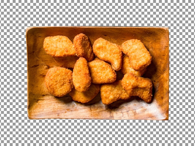 Nuggets de frango frito em uma bandeja de madeira isolada em fundo transparente