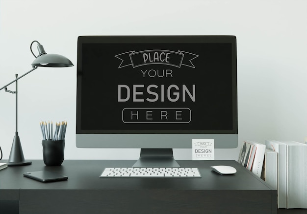 PSD ordinateur sur table dans l'espace de travail mockup