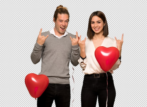 Paar am valentinstag rock geste machen