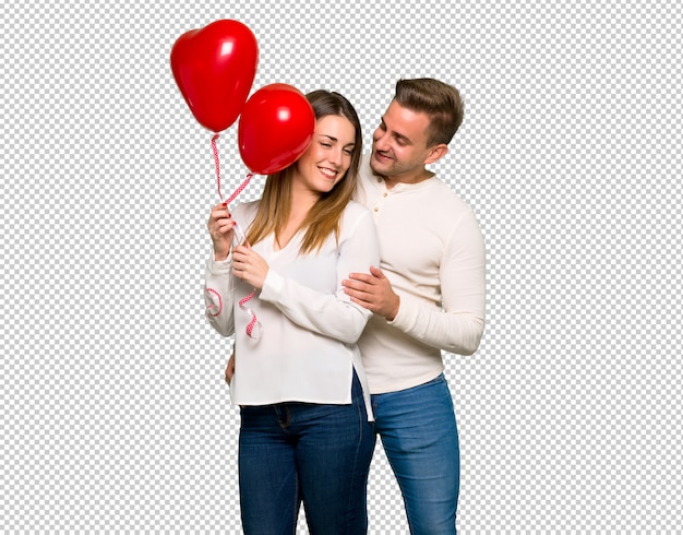 Paar im valentinstag mit ballons mit herzform