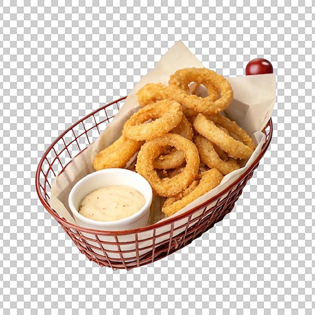 Un panier d'anneaux d'oignon croustillant avec une petite tasse de sauce de trempage sur le côté