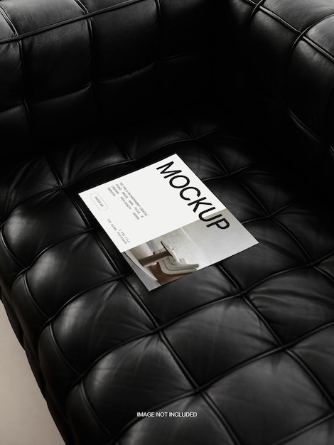 PSD papel branco a4 flyer poster banner documento modelo de maquete editável em sofá de couro preto psd