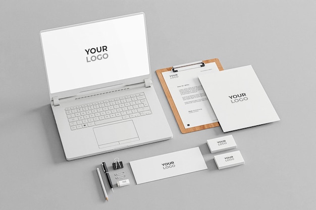 PSD papelería mockup white realistic company business con laptop