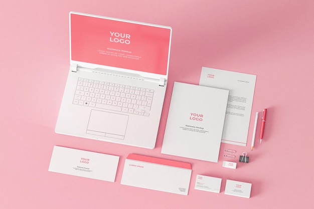 PSD papeterie mockup pink company business avec ordinateur portable