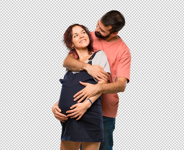 Par, com, mulher grávida, abraçando