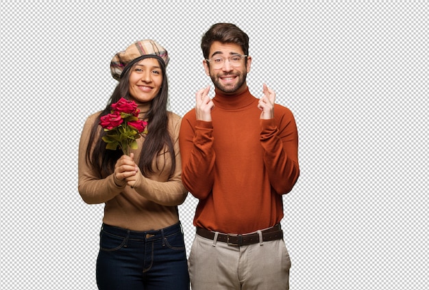 Par jovem, em, dia valentines, cruzamento, dedos, para, tendo, sorte
