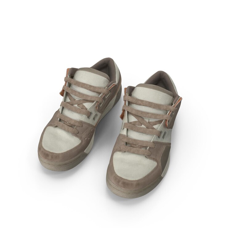 PSD un par de zapatillas de deporte marrones y beige desgastadas