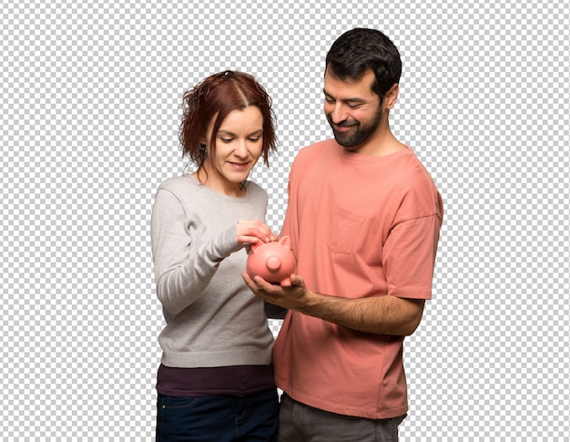 Pareja en el día de san valentín tomando una alcancía