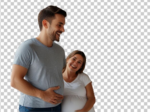 Una pareja feliz sintiendo los movimientos del vientre del bebé de la futura madre