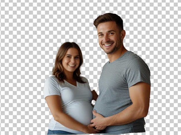 Una pareja feliz sintiendo los movimientos del vientre del bebé de la futura madre