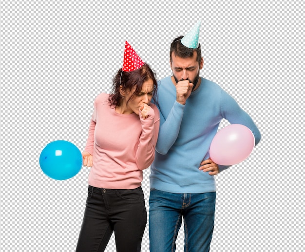 PSD pareja con globos y sombreros de cumpleaños sufre de tos y sentirse mal